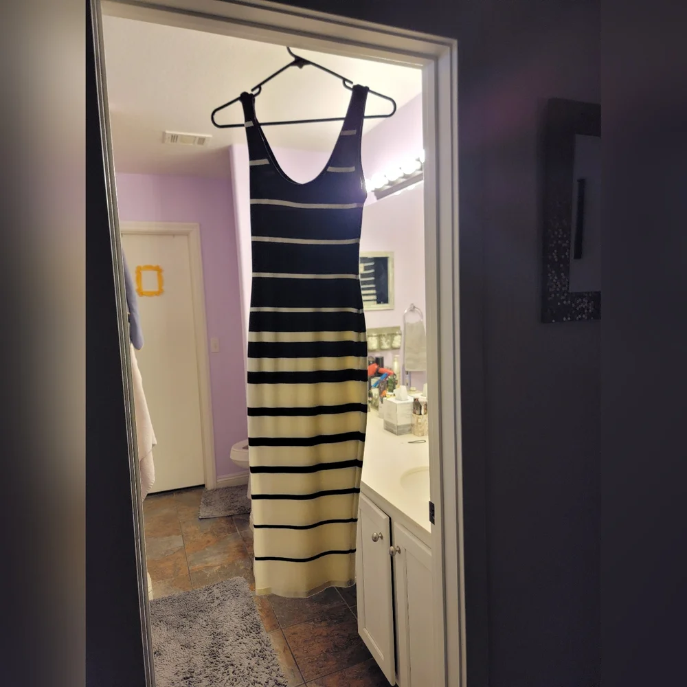 Never been worn black and white dress with side slit, in excellent condition. - Picture 2 of 5